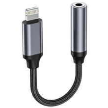 Kafelek Lightning do jack 3,5 mm z adapterem na jasnym tle.